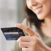 Woman holding a credit card