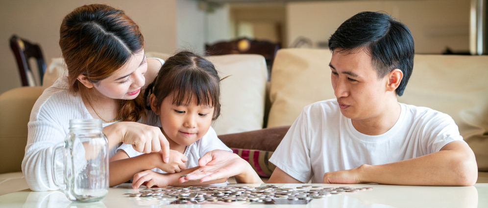 Family counting their coins