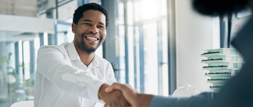 two men shaking hands