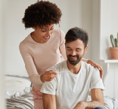 A couple smiling together.