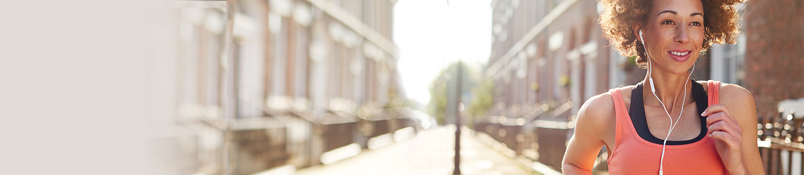 Woman jogging through town