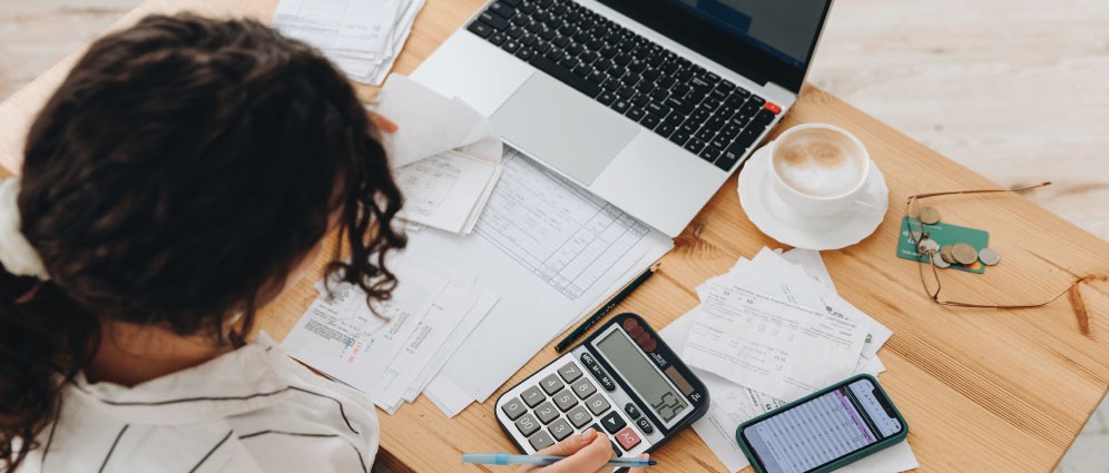 A woman calculating numbers