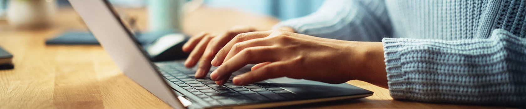 Image of hands on a keyboard