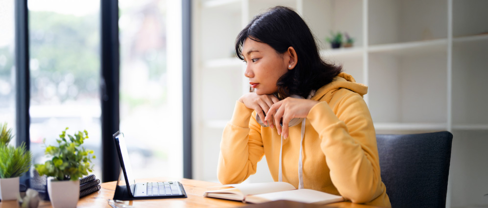 Woman looking at a laptop screen