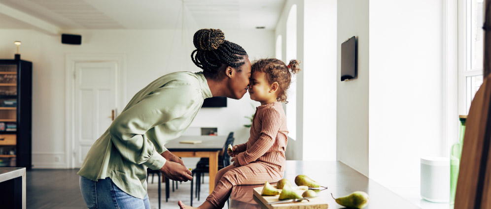 A mother and daughter showing affection